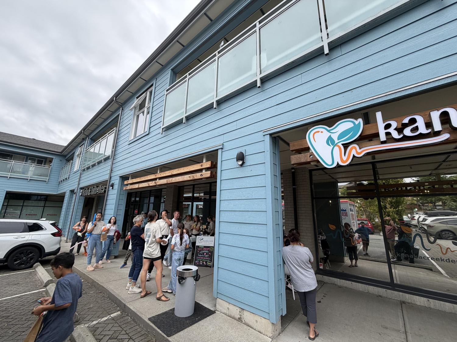 Families lined up outside Kanaka Creek Family Dental in Maple Ridge during Patient Appreciation Day